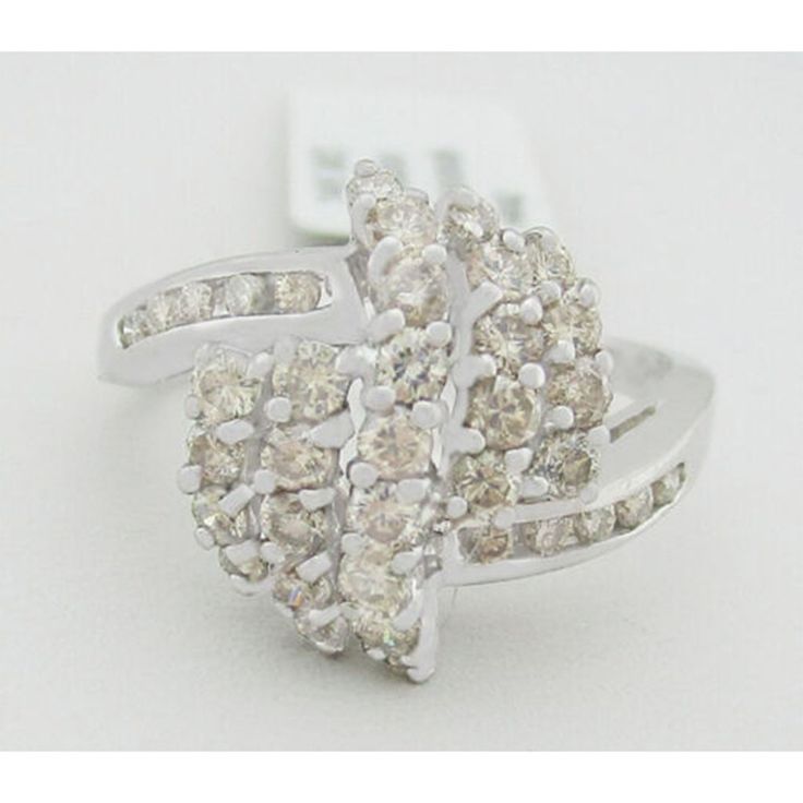 Total Carat Weight: 1.50 Cts Secondary Stone: Diamond Main Stone Color: White Number Of Diamonds: 37 Ring Size: 6.5 (Free Resizing Service - If Needed) Main Stone Shape: Round Base Metal: Gold Diamond Clarity Grade: Vs2 Setting Style: Prong Cut Grade: Very Good Metal Purity: 14k Main Stone: Diamond Metal: White Gold Diamond Color Grade: Jk White Dazzling Diamond Ring Gia Certified, White Gia Certified Dazzling Diamond Ring, White Dazzling Gia Certified Diamond Ring, Gia Certified Cluster Rings In White, White Diamond Cluster Ring With Center Stone, White 14k Gold Cluster Ring With Center Stone, White Round Cluster Ring With Brilliant Cut, White Brilliant Cut Round Cluster Ring, White Brilliant Cut Cluster Ring