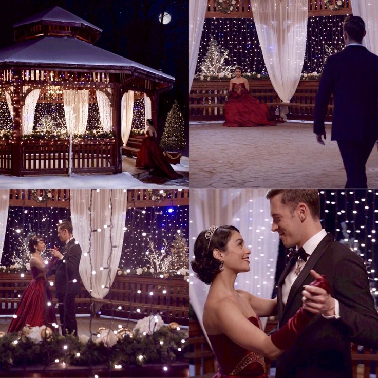 a couple dancing in front of a gazebo with christmas lights on the ground and people standing around