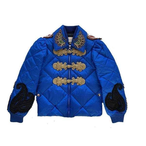 Gucci lightweight quilted parachute nylon bomber jacket.Approx. 21.3"L from shoulder to hem.Spread collar; zip front and toggle closures.Long sleeves; ribbed, elasticized cuffs.Paisley appliqués on the sleeves.Embroidered spaniel dog appliqués with flames on back.Fitted silhouette.Straight hem.Nylon.Made in Italy.  Our products are 100% genuine. In some cases we purchase merchandise from trusted independent suppliers and not directly from the brand owner. In all cases we stand by the authenticit Lightweight Quilt, Buy Gucci, Spaniel Dog, Jackets Online, Brunei, Spaniel, Puma Jacket, Birmingham, Paisley