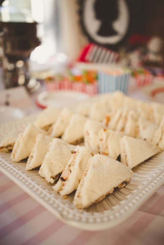 some food is on a white plate and ready to be eaten at a party or gathering