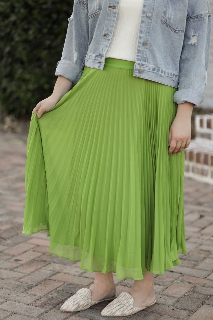 The Chasity Pleated Skirt has such an elegant style! This midi length skirt is fully lined and is detailed with accordion pleats. This flowy, fun skirt is perfect to jazz up your style! - Elastic waistband - Accordion-style pleats - Midi length - Fully lined - Material: Self: 100% Polyester | Lining: 100% Polyester - Model is wearing a small. Color Disclaimer: Actual colors may vary due to computer monitors. *Measurements are taken flat and then doubled.* Size Waist Length Small 25" 32" Medium 2 Flowy A-line Maxi Skirt With Accordion Pleats, Flowy Midi-length Pleated Skirt With Lining, Solid A-line Skirt With Accordion Pleats, Relaxed Midi-length Pleated Skirt With Lining, Spring Midi-length Accordion Pleats Skirt, Skirts For Kids, Boys Denim, Shoes Sandals Heels, Midi Length Skirts