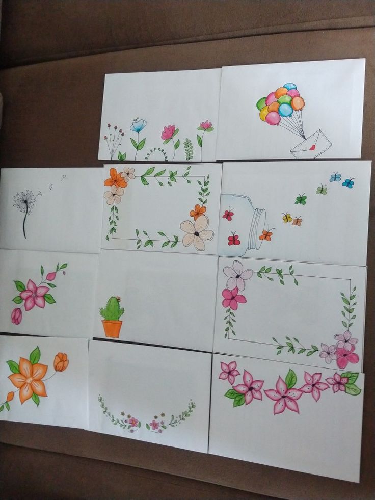 several cards with flowers and balloons on them