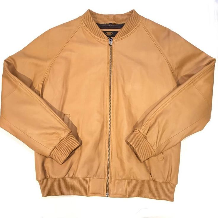 G-Gator Lambskin Varsity Jacket Material(s): Leather, Cotton Style: Bomber Color(s):Tan Beige Leather Jacket With Zipper Closure, Fall Beige Leather Outerwear, Beige Leather Long Sleeve Outerwear, Beige Leather Outerwear With Zipper Closure, Beige Leather Biker Jacket For Work, Fall Cognac Leather Outerwear, Cognac Leather Outerwear For Fall, Beige Leather Biker Jacket For Fall, Classic Beige Leather Outerwear