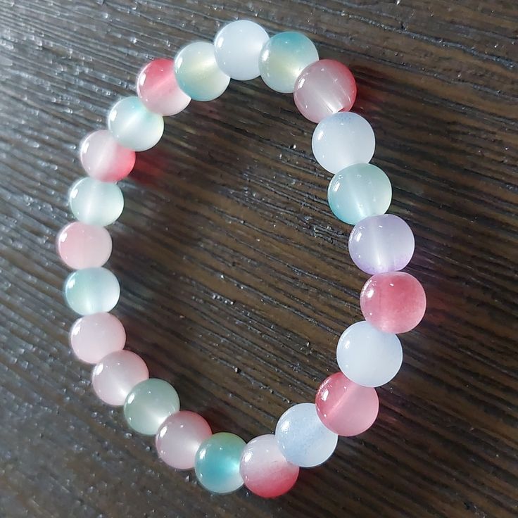 Cute Handmade Beaded Bracelet!!! Blue, Pink Color. Great Gift!! Pink Stretch Bracelet With 8mm Beads For Beach, Pastel Beaded Bracelets With Colorful Round Beads, Casual Pink Beaded Bracelets With Faceted Beads, Casual Pink Stretch Bracelet With Round Beads, Casual Pink Crystal Bracelet With Colorful Beads, Casual Pink Jewelry With Faceted Beads, Casual Pink Beaded Crystal Bracelet, Casual Pink Beaded Bracelets With Colorful Beads, Casual Pink Beaded Bracelets With Round Beads