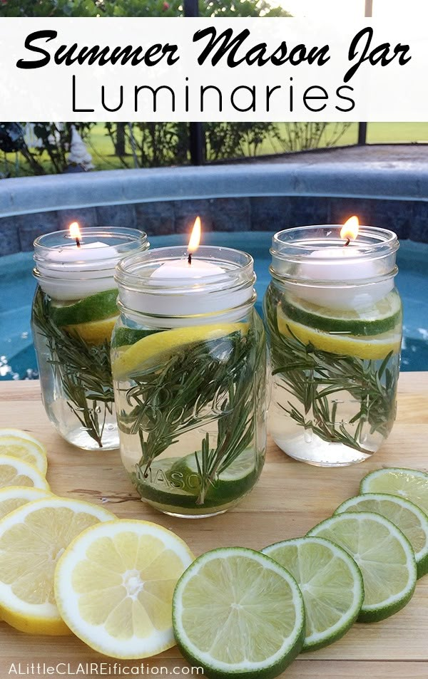 four mason jars filled with lemon slices and limes next to a swimming pool full of water