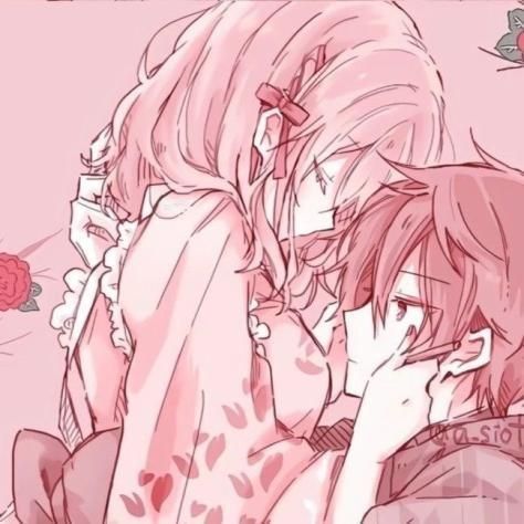 two anime characters are hugging each other in front of a pink background with red flowers