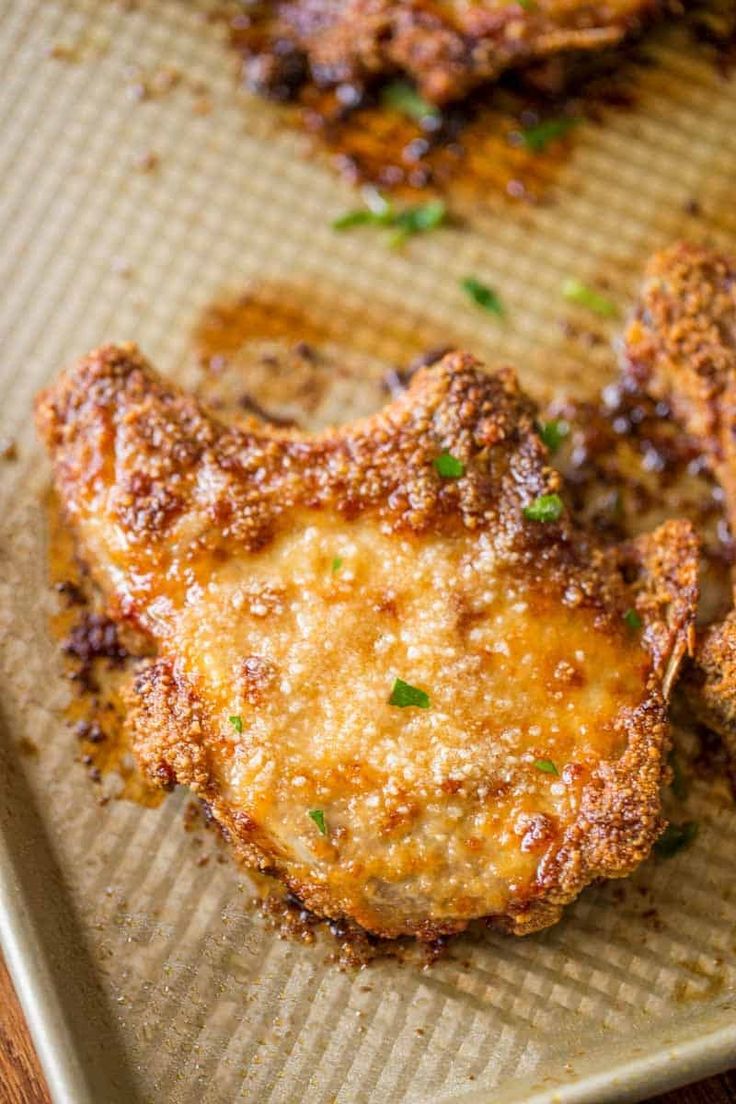 some fried food is on a baking sheet