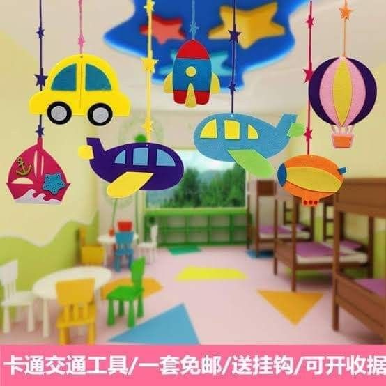 a child's room with toys hanging from the ceiling and on the walls, in different colors