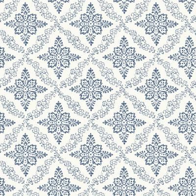 an ornate blue and white wallpaper pattern