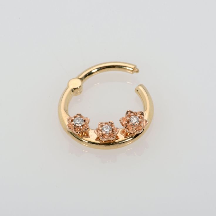 Septum Clicker Clicker: 14k yellow gold - flowers 14k rose gold. Gold color flower and clicker can be changed as you wish Natural white diamonds 1.3mm-1.5mm-1.8mm Inner Diameter; 6mm,7mm,8mm, 10mm Septum ring: 18g, 16g , 14g. Materials :14K solid gold yellow god,rose gold,white gold Option stone: Emerald, Sapphires , Ruby, Black Diamonds Elegant Internally Threaded Huggie Nose Rings, 14k Yellow Gold Ear Cuff For Wedding, Elegant Pierced Septum Ring As Gift, Elegant Internally Threaded Yellow Gold Jewelry, 14k Gold Ear Cuff For Wedding, Wedding Yellow Gold Internally Threaded Nose Rings, Rose Gold 14k Huggie Rings, Elegant Septum Ring As A Gift, Dainty Yellow Gold Ear Cuff For Wedding