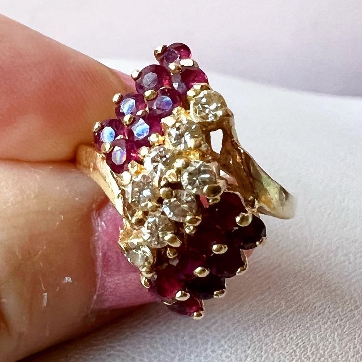 Fabulous Vintage Ring In Solid 14k Yellow Gold (Stamped And Also Tested). Ring Is Size 5.25 On Ring Mandrel, Weights 4.6 Grams. With Vibrant Genuine Rubies And Diamonds. I Do Not Have An Info On Stones, But They Are Absolutely Genuine. There Are 16 Round Cut Rubies And 8 Round Cut Bright Diamonds ! Rubies Are Super Vibrant & Diamonds Are Eye Clean, Sparkly White!!! Very Beautiful Cocktail Ring !!! Red Multi-stone Jewelry, Red Cluster Diamond Ring In 14k Gold, Red Diamond Cluster Ring In 14k Gold, Cluster Ruby Rings With Diamond Accents, Ruby Cluster Rings With Diamond Accents, Cluster Jewelry For Anniversary, Red Cluster Ring Stamped 14k, Red 14k Stamped Cluster Ring, Red Diamond Cluster Ring In Fine Jewelry Style