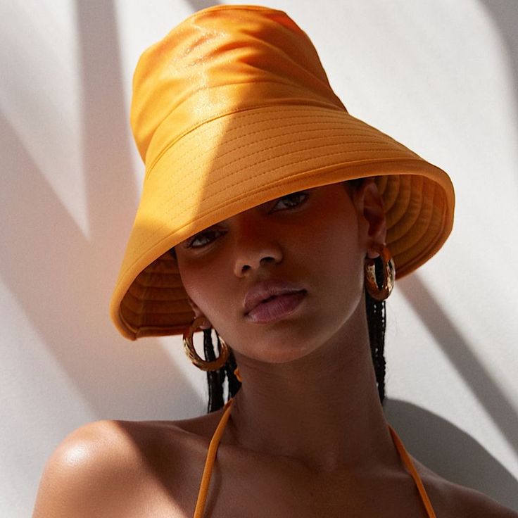 New With Tag. Oversized Bucket Hat With An Allover Metallic Shimmer. Ribbed Wide Brim Perfect For Keeping You Cool On Sunny Days. - 85% Polyester, 15% Spandex - Spot Clean Trendy Orange Bucket Hat For Summer, Trendy Orange Summer Bucket Hat, Orange Wide Brim Sun Hat, Solid Summer Visor Bucket Hat, Adjustable Orange Bucket Hat For Spring, Orange Bucket Hat For Summer, Solid Color Summer Visor Bucket Hat, Orange Brimmed Bucket Hat For Spring, Retro Visor Hats For Spring