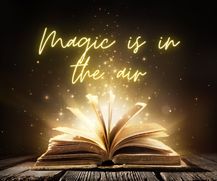 an open book with the words magic is in the air