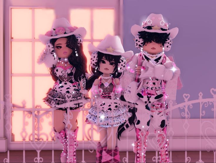 three dolls are dressed in pink and black outfits