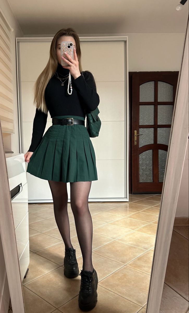 Green Skater Skirt Outfit, Christmas Outfit Green Skirt, Green And Black Skirt Outfits, Outfit Ideas With Green Skirt, Dark Green Sweater Vest Outfit, Green Skirt Black Top, Forest Green Skirt Outfit, Emerald Green Aesthetic Outfits, Dark Green Winter Outfit