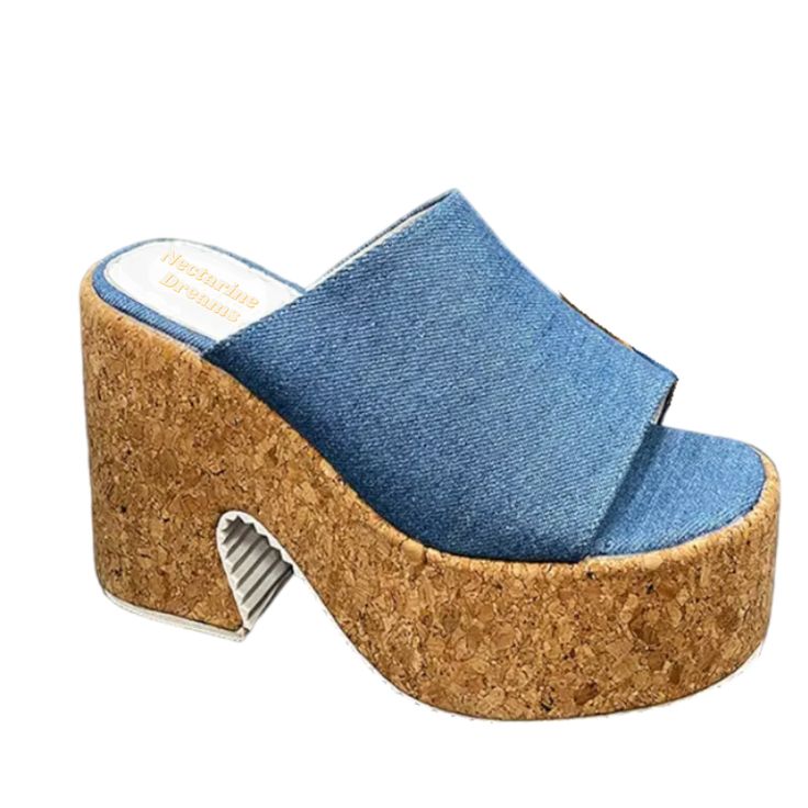 Introducing our stunning retro-inspired Josie platform sandals - the perfect addition to your summer shoe collection! With their 70's-inspired design and comfortable fit, these sandals will take you back in time and elevate your fashion game. Features: Denim open toe design perfect for spring and summer Comfy lightweight cork platform with 12 cm heel Whether you're dressing up for a night out or running errands around town, these versatile sandals will effortlessly elevate any outfit with their Summer Chunky Platform Slip-on Sandals, Summer Slip-on Sandals With Chunky Platform, Chunky Platform Slip-on Sandals For Summer, Summer Chunky Platform Open Toe Mules, Summer Open Toe Chunky Platform Mules, Summer Slip-on Clogs With Padded Heel, Vintage Open Heel Wedge Sandals For Summer, Casual Summer Platform Slippers With Padded Heel, Casual Platform Slippers With Padded Heel For Summer