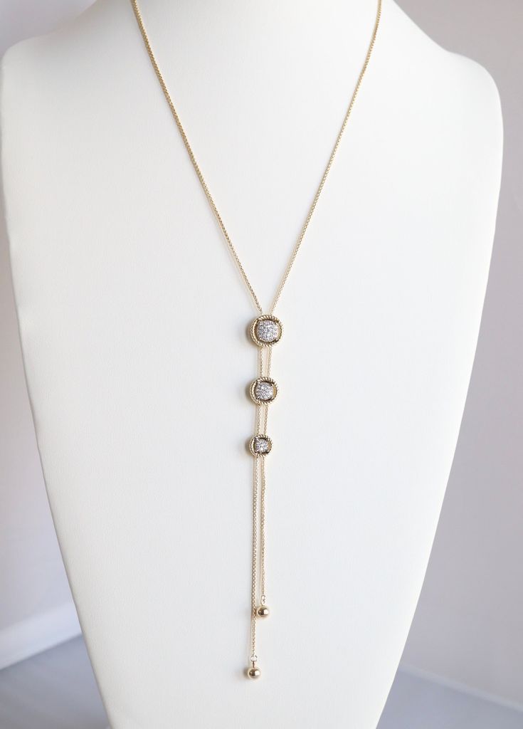 This simple but elegant gold necklace is perfect for any occasion. It features a delicate chain and a sparkling solitaire diamond. The necklace is adjustable, so you can wear it as a choker or a longer necklace. Chic Round Necklace With Adjustable Fit, Dainty Gold Necklace With Adjustable Length, Elegant Adjustable Choker Jewelry, Gold Dainty Necklace With Adjustable Length, Elegant Adjustable Length Chain Choker Necklace, Elegant Adjustable Length Choker Chain Necklace, Yellow Gold Plated Necklace With Adjustable Length, Dainty Gold Rhinestone Necklace For Party, Elegant Adjustable Choker Charm Necklace