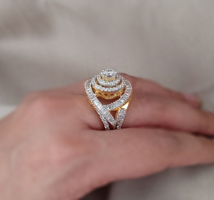 Elevate your elegance with our Golden Grace CZ Ring, meticulously crafted in silver and adorned with unique 5A lab-created diamonds by CZ for a luxurious appearance resembling real diamonds. Finished with 18kt gold plating and a highly-reflective rhodium polish, this ring not only exudes grace but also ensures long-lasting shine and durability, making it a perfect addition to your jewelry collection. Finish: Yellow Gold Plating Material: Silver, Alloy, CZ Stones Color: Gold, White Size: One Size