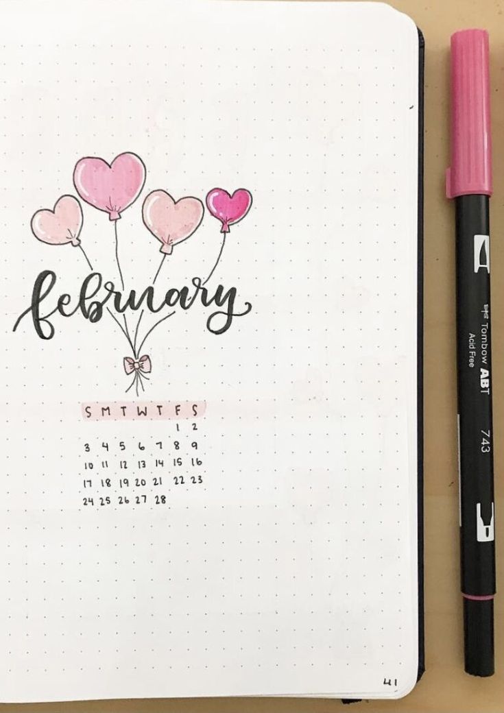 a calendar with balloons and the word february written in cursive writing on it