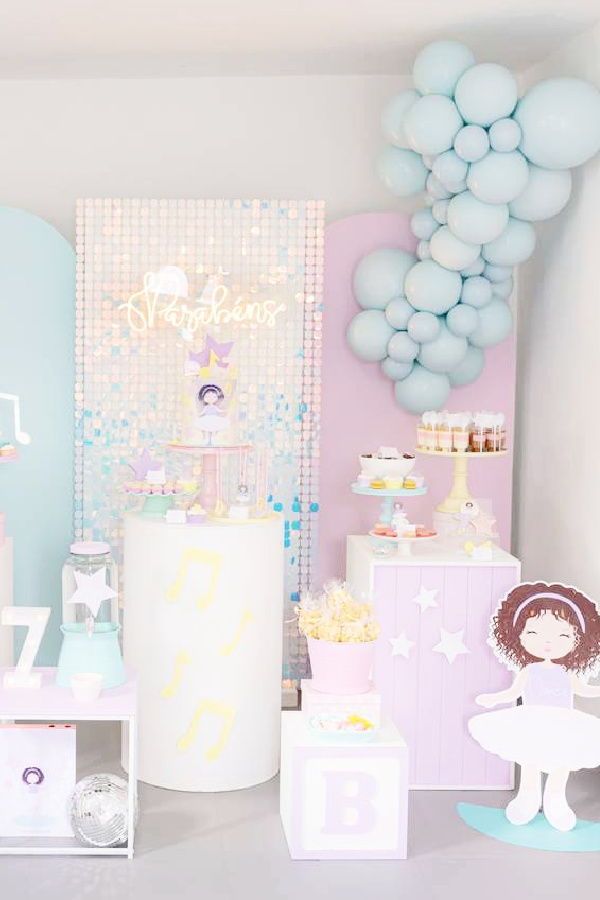 a room filled with lots of decorations and balloons