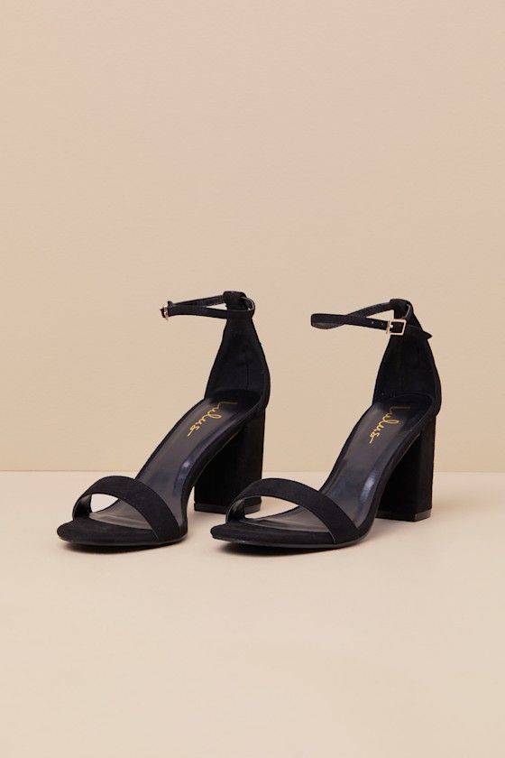 You're certain to step up your style essentials when you add the Lulus Arylee Black Suede Ankle Strap Heels to your closet! Soft faux suede shapes a single toe strap, an almond-shaped toe bed, and a wrapped block heel. A dainty ankle strap rises from the sturdy heel cup and secures with a gold buckle. 3" wrapped block heel. Cushioned insole. Felted rubber sole has nonskid markings. All Man Made Materials. Imported. Lulus | Arylee Black Suede Ankle Strap Heels. Black Heels Block, Bridesmaids Shoes Black, Black Heels With Gold Accent, Thrift Heels, Prom Short Heels, Heels Classy Elegant Black, Black Homecoming Heels, Heels For Black Dress, Black Heels Wedding