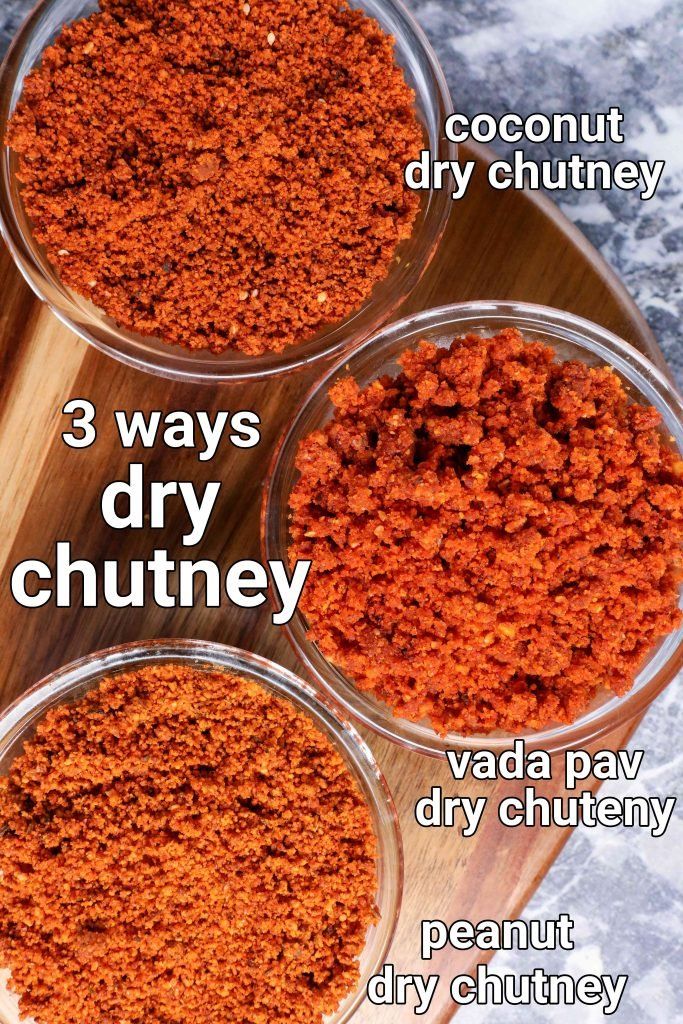 three glass bowls filled with different types of dry chutneys on top of a wooden cutting board