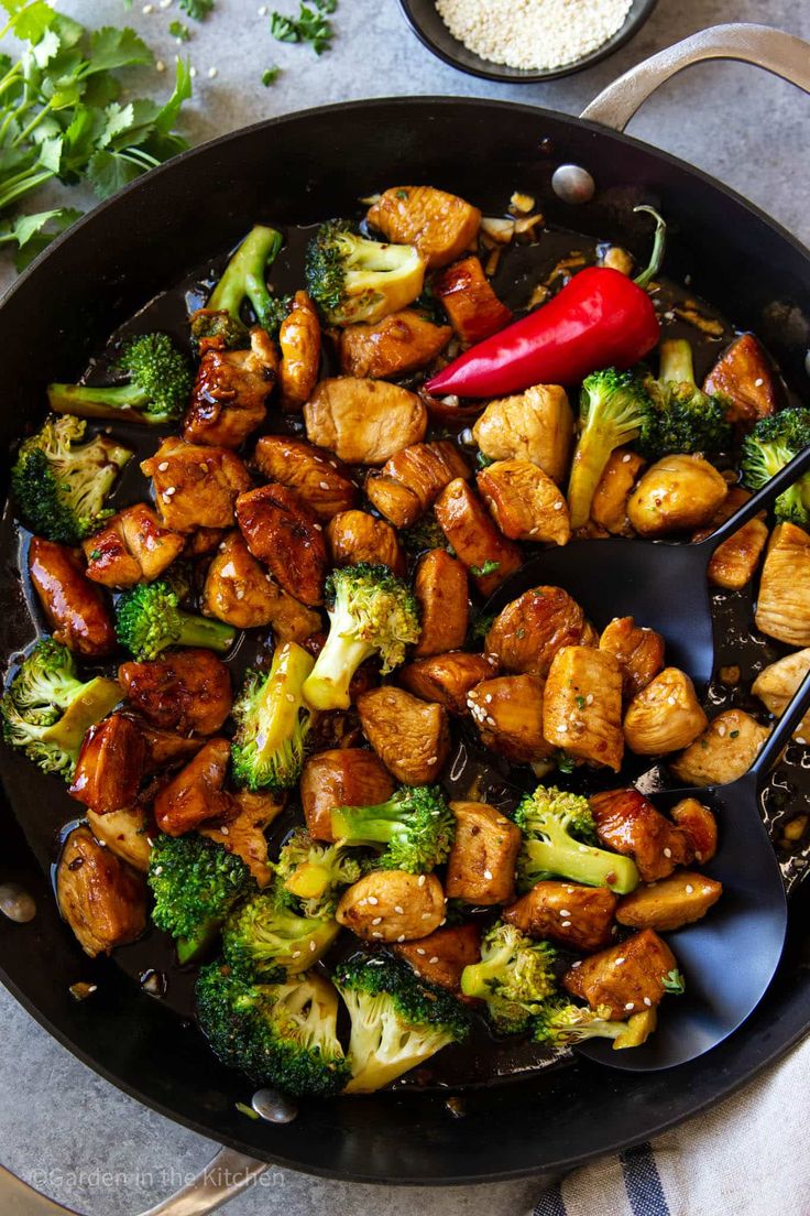 chicken and broccoli stir fry in a skillet with the title above it