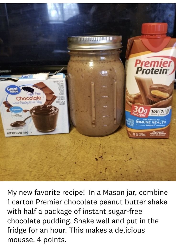 a jar of chocolate pudding next to a carton of milk and a package of protein protein