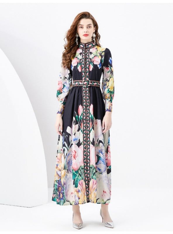 Orchestrating a symphony of floral elegance, this dress is a wondrous blend of colorful blooms set against a soft ivory backdrop. Its long sleeves and high neck collar exude a regal charm, accentuated by a rich tapestry of botanical motifs in vibrant hues that seem to tell tales of hidden gardens in full bloom. The slim waist is defined by a delicate, patterned belt that leads to a gently pleated skirt, allowing the fabric to cascade gracefully to mid-calf length. Ethereal and sophisticated, thi Hidden Gardens, Ivory Backdrop, Botanical Motifs, High Neck Collar, Sleeveless Dresses Casual, Flounce Skirt, Push Up Swimsuit, Beach Swimsuit, White Maxi