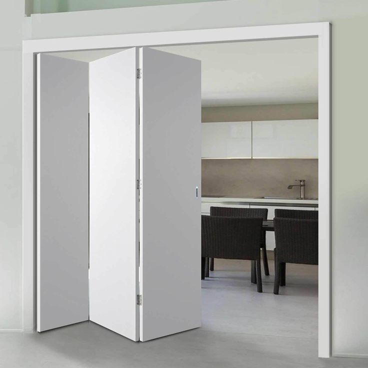 an open room divider in the middle of a kitchen