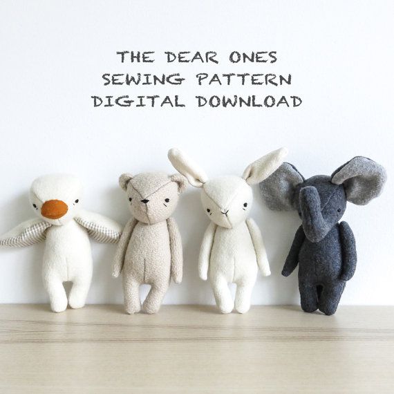 four stuffed animals lined up against a white wall with the words, the dear ones sewing pattern digital downloaded