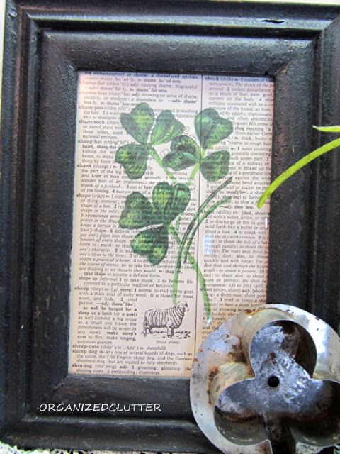 an old book page with a plant on it and a metal faucet next to it