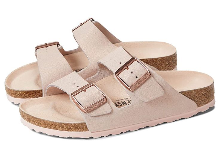 Birkenstock Arizona - Women's Shoes : Shimmering Light Rose Suede : Keep it classy and comfortable during your casual street strolls wearing the Birkenstock Arizona Sandals. Easy slip-on style with dual buckle straps. Round open toe. Suede uppers. Leather lining and insoles. Lightweight and shock-absorbing EVA outsole. Imported. Measurements: Weight: 8 oz Product measurements were taken using size EU 38 (US Women's 7-7.5), width Narrow. Please note that measurements may vary by size. Trendy Footbed Sandals With Buckle Closure For Spring, Spring Slip-on Footbed Sandals With Buckle Closure, Spring Buckle Closure Slip-on Slides, Trendy Leather Footbed Sandals For Spring, Trendy Double Strap Cushioned Footbed Sandals, Spring Footbed Sandals With Buckle Closure And Round Toe, Spring Buckle Closure Footbed Sandals With Round Toe, Trendy Double Strap Slides With Cushioned Footbed, Spring Slides With Buckle Closure And Round Toe