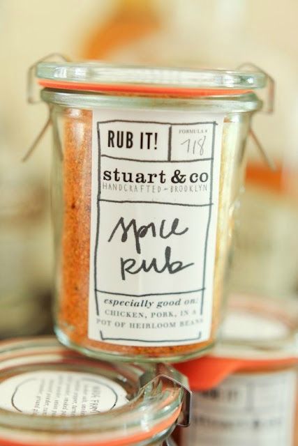 several jars of spices are stacked on top of each other, with the labels labeled rub it and stuart & co