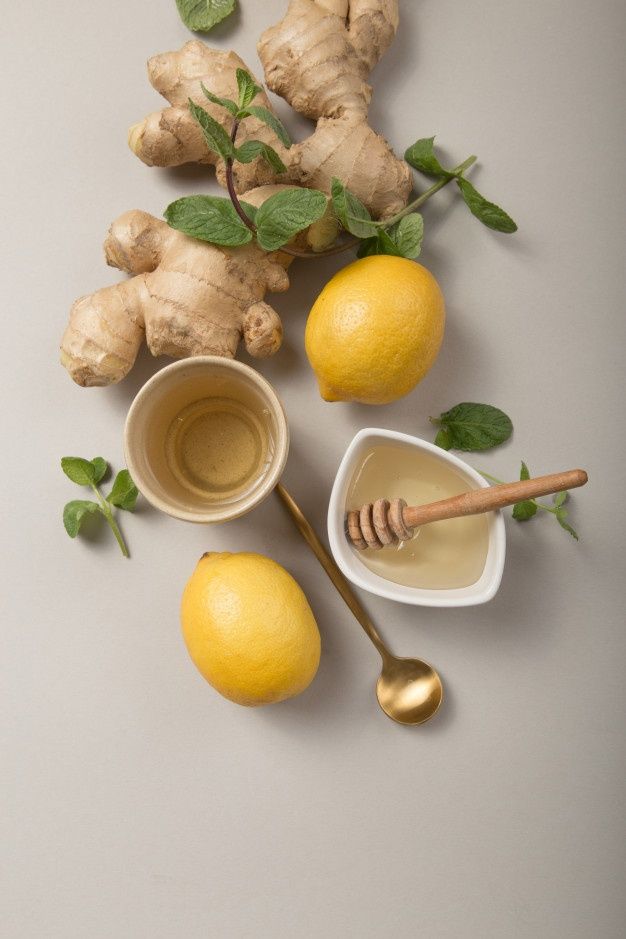 lemons, ginger and honey are on the table