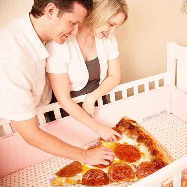 a man and woman are looking at a pepperoni pizza