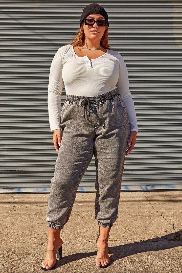 Who knew being comfy could look sooo good?! You’ll love the fit and feel of our Plus Size Loungewear Jogger. Not only is it super easy to wear, but it’s super trendy as well! Featuring an elastic waistband with drawstrings and elastic hems to adjust to your comfort and liking. These joggers are super versatile and you can choose to dress them up or down! Wear them casually with a tee or bodysuit and sneakers, or dress them up with a form-fitting top, an oversized jacket, and heels! Product Detai Trendy Cotton Joggers For Lounging, Trendy Joggers For Lounging In Fall, Trendy Leisure Joggers With Elastic Cuffs, Trendy Joggers With Elastic Waistband, Casual Joggers With Elastic Waistband For Loungewear, Trendy Sweatpants For Everyday, Trendy Joggers With Elastic Waistband For Lounging, Casual Joggers With Elastic Waistband For Leisure, Trendy Stretch Joggers For Lounging