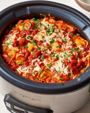 a close up of a casserole dish in a crock pot on a table