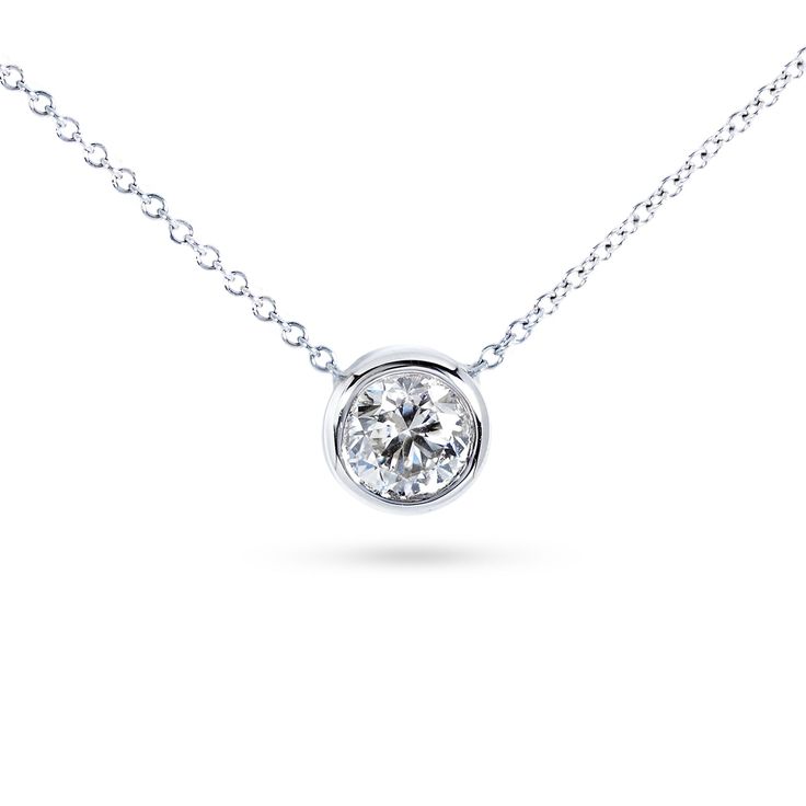 Round Bezel Moissanite Solitaire Necklace 14K Gold 16" Chain (7.5mm, 1 1/2ct DEW) Moissanite Solitaire Necklace In Round Cut, Moissanite Necklace In Diamond White With Bezel Setting, Moissanite Necklaces In Diamond White With Bezel Setting, Moissanite Solitaire Round Cut Necklace, Diamond White Moissanite Necklace With Bezel Setting, Solitaire Moissanite Necklace With Round Cut, Yellow Gold Solitaire Diamond Necklace With Tension Setting, 14k White Gold Solitaire Necklace With Round Stone, Fine Jewelry Moissanite Necklace With Bezel Setting