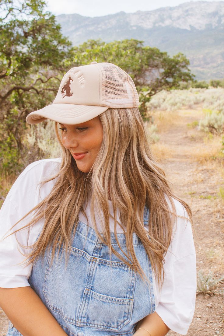 These trucker hats are our new favorites, and they will be yours too! Each style of hat has an adjustable band. Wear them with your hair down or up, and it will instantly make any outfit complete. This hat is pink with, "YEEHAW" embroidered text, and a brown printed image. Embroidered Text, Work Hairstyles, Hair Down, Down Hairstyles, Trucker Hats, Print Images, Trucker Hat, Outfit Inspirations, Band