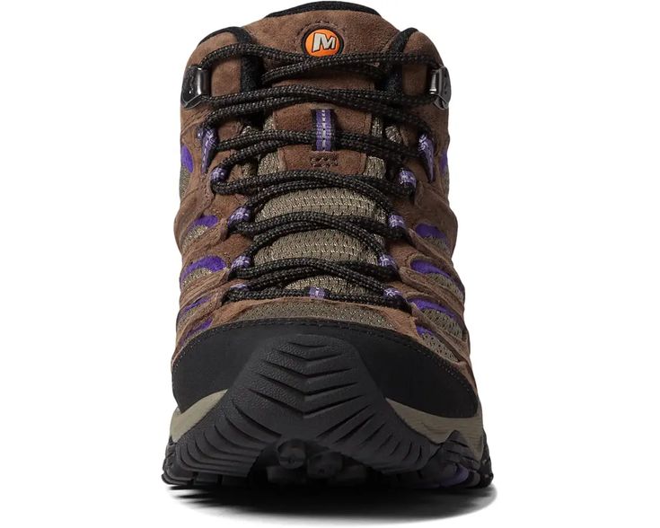 the side view of a brown and purple hiking shoe