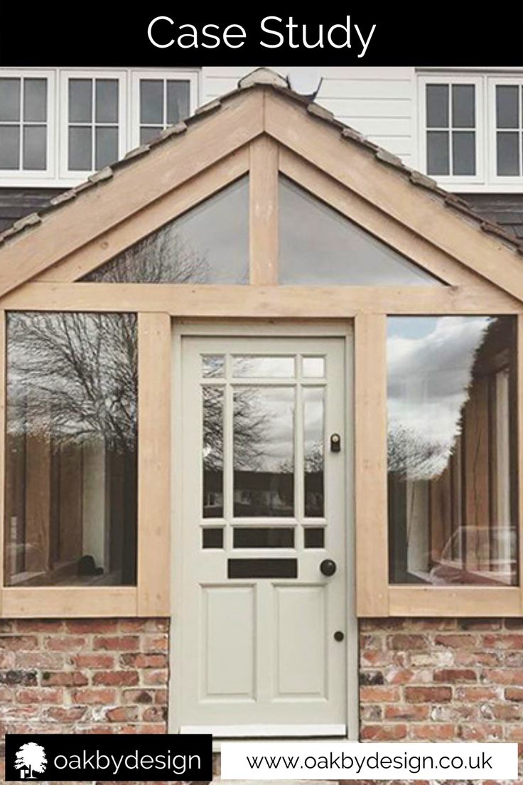 the front door of a house with windows