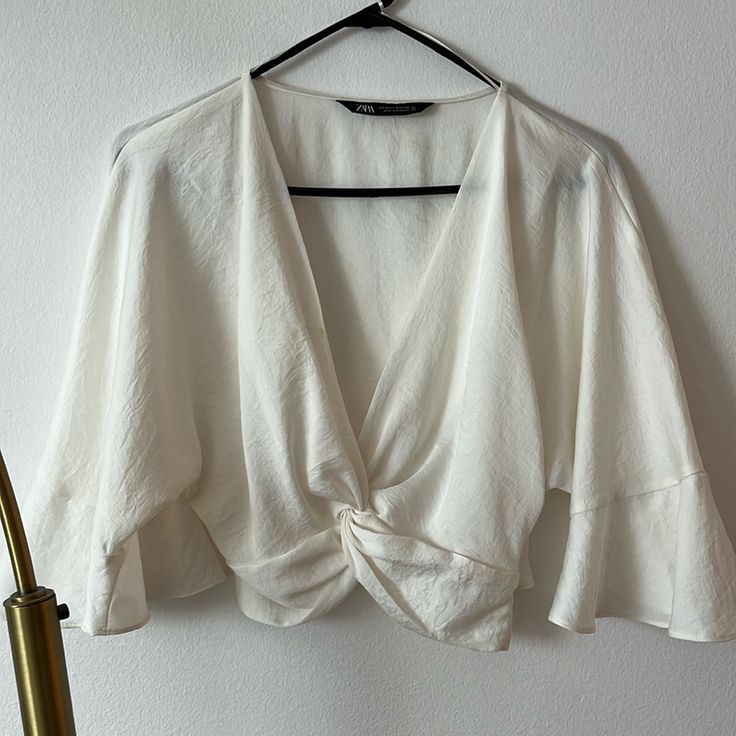 Silky Blouse, Fitted Through Waist With A Side Zip Closure. Never Worn. Chic White Crop Top For Spring, Chic White V-neck Crop Top, Elegant Cropped Blouse By Zara, Elegant Cropped Zara Blouse, White V-neck Crop Top For Spring, Elegant V-neck Crop Top For Day Out, White Cropped Chic Top, Elegant Zara V-neck Crop Top, White Crop Top For Brunch