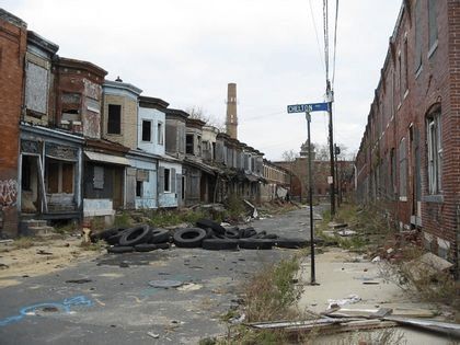 an old run down city street filled with lots of debris