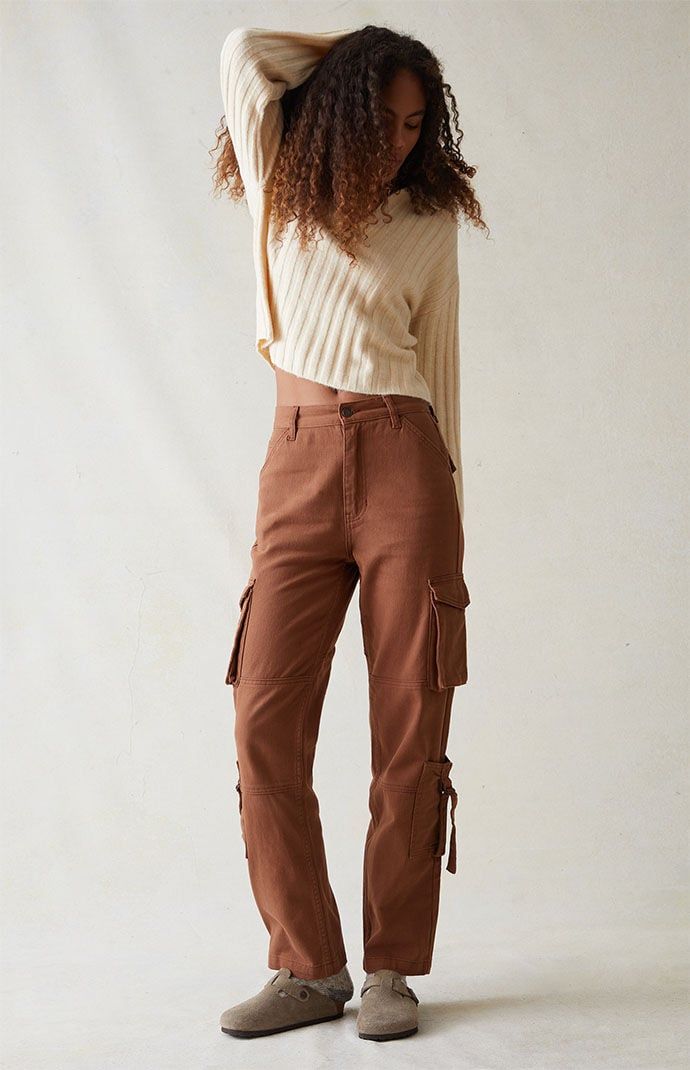 The Comfort Stretch Brown Cargo Dad Pants from PacSun are one piece that lives up to their name with a hint of utility. These classic high-waisted pants are made with garment-dyed stretch fabric for added comfort and feature cargo side pockets, patch pockets with loop straps, a paneled body, and a straight-leg fit that transitions from casual outings to outdoor adventures. PacSun Womens Comfort Stretch Brown Cargo Dad Pants size 24 Carpenter Pants Outfit, Cargo Outfits Women, Brown Cargo Pants Outfit, Fall Camping Outfits, Dad Pants, Brown Cargo Pants, Womens Outdoor Clothing, Cargo Pants Outfit, All Jeans