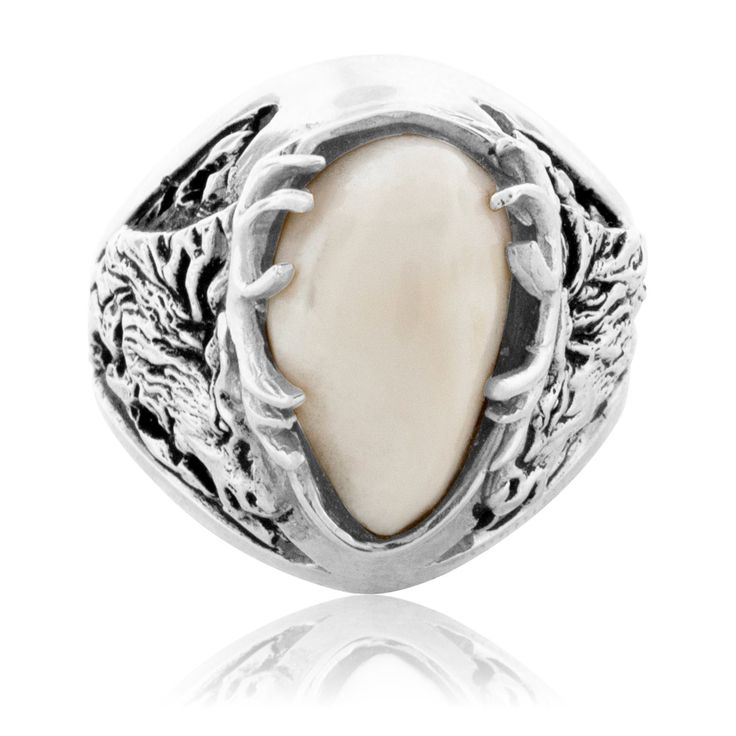 This elk head and antler ring is boldly and magnificently hand carved and individually created by the talented designers at Park City Jewelers to showcase your treasured elk's tooth ivory. Each unique elk ivory is carefully trimmed, perfectly fitted, and securely set beneath surrounding elk antlers in your choice of 14K yellow gold, 14K white gold, or 14K rose gold. This handsome elk mounting is sure to evoke memories of your exciting elk hunting years. Bold and ruggedly handsome, this finely cr Elk Ivory Ring, Elk Ivory Jewelry, Elk Ivory, Ivory Jewelry, Elk Head, Freeform Ring, Ivory Ring, Tooth Ring, Antler Ring