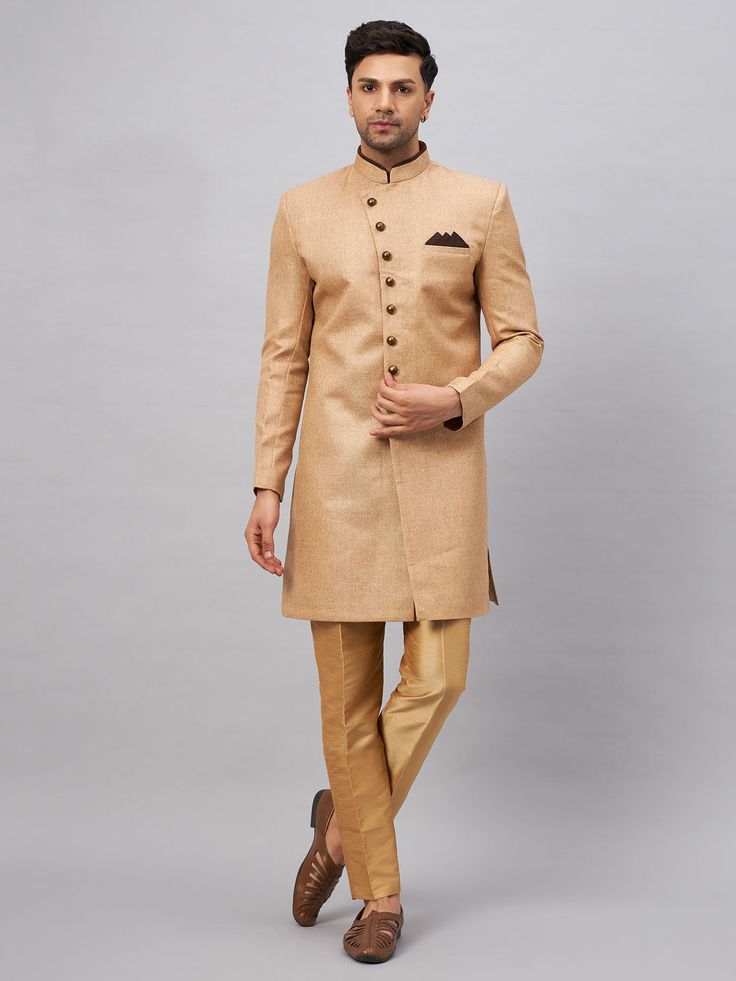 Vastramay Men's Beige Indo Western Set A stylish fusion of traditional and contemporary, this Men's Beige Indo Western Set from Vastramay is perfect for special occasions. Crafted from high-quality fabric, it offers comfort and style. Pair it with matching accessories for a complete look. Features: Stylish Indo Western design High-quality fabric for comfort Perfect for special occasions Specifications: Color: Beige Material: Fabric Size: Available in various sizes Material & Care: Material: Fabr Classic Fitted Traditional Wear For Ceremonies, Classic Fitted Kurta For Festive Occasions, Classic Fitted Traditional Wear For Eid, Elegant Fitted Linen Kurta, Classic Tailored Sherwani For Festive Occasions, Classic Fitted Kurta For Semi-formal Occasions, Fitted Beige Traditional Wear For Ceremonial Occasions, Ceremonial Fitted Beige Traditional Wear, Classic Fitted Sherwani For Eid