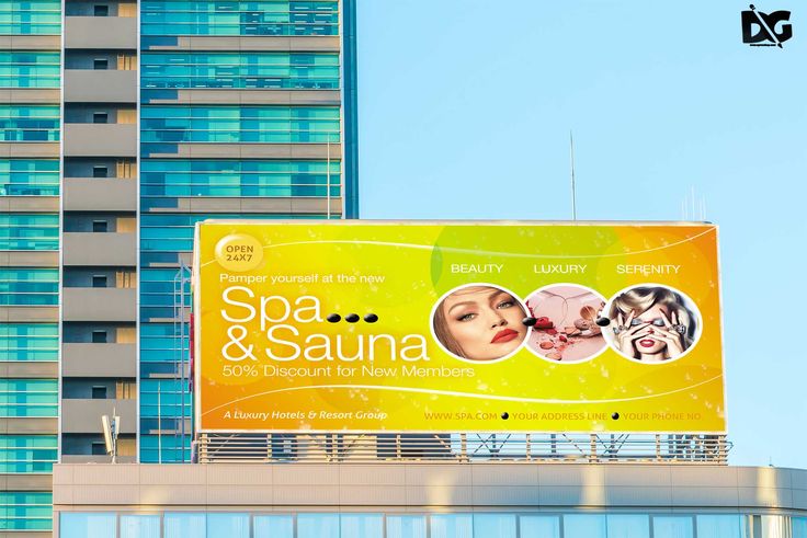 an advertisement for spa and sauna on the side of a building in front of a skyscraper