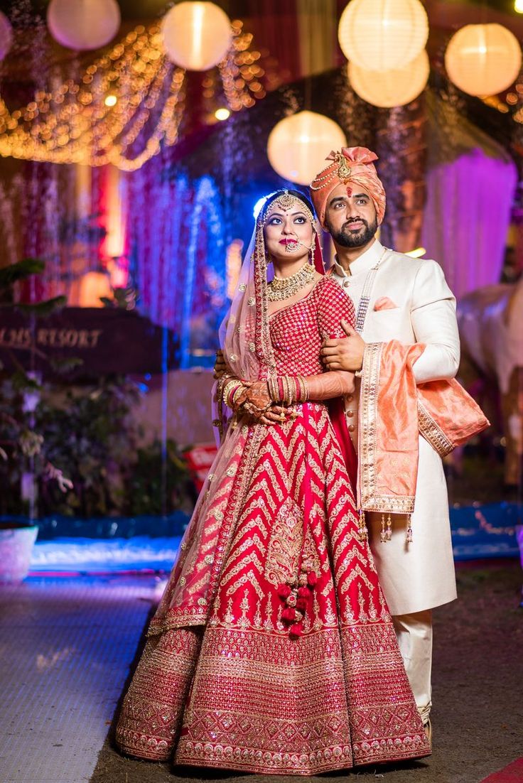 Photo of Contrasting bride and groom with bride in chevron lehenga Bride Groom Photoshoot, शादी की तस्वीरें, Bride Groom Poses, Indian Bride Poses, Indian Bride Photography Poses, Indian Wedding Poses, Bride Photos Poses, Indian Wedding Bride, Groom Photoshoot