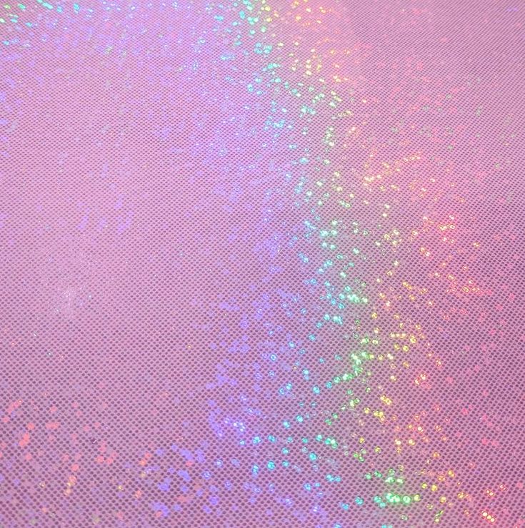 the back side of a cell phone with colorful glitters on it's screen